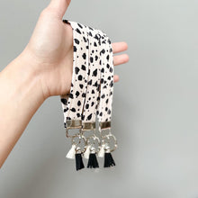 Load image into Gallery viewer, Handmade Cow Print Key Fob with Tassels
